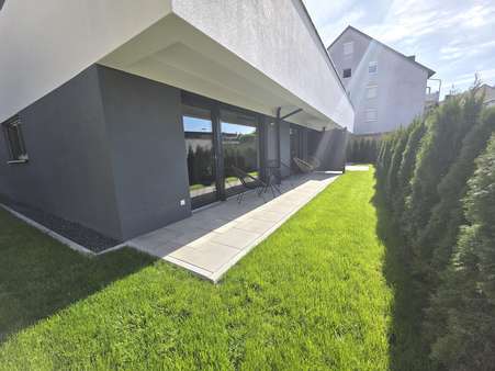 Terrasse mit Gartenanteil Terrasse mit Gartenanteil - Erdgeschosswohnung in 92637 Weiden mit 80m² kaufen