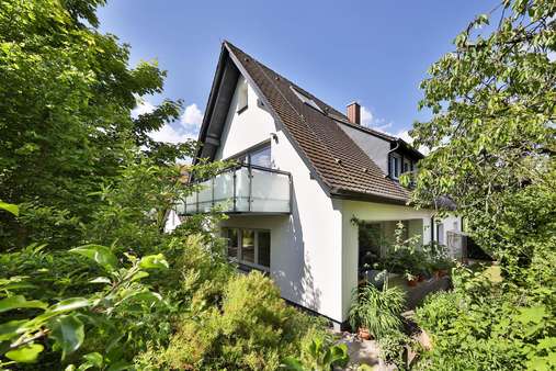 Seitenansicht Haus - Zweifamilienhaus in 90451 Nürnberg mit 200m² kaufen