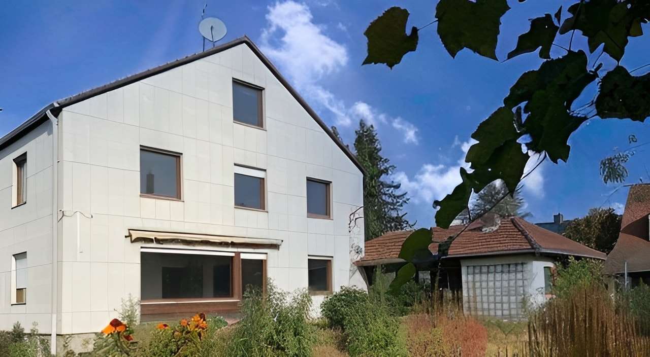 Titelbild - Einfamilienhaus in 90765 Fürth mit 145m² kaufen