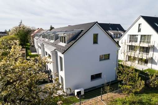 Seitenansicht Reihenhäuser - Reihenmittelhaus in 90765 Fürth mit 109m² kaufen