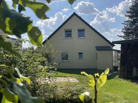 Gartenansicht - Einfamilienhaus in 95191 Leupoldsgrün mit 95m² kaufen