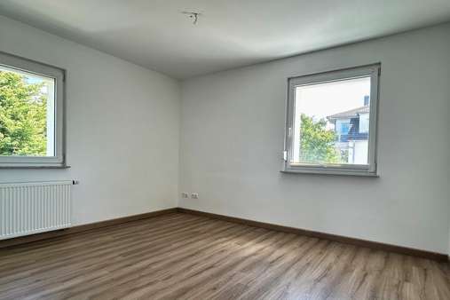 Wohnzimmer Wohnzimmer - Etagenwohnung in 96231 Bad Staffelstein mit 65m² mieten