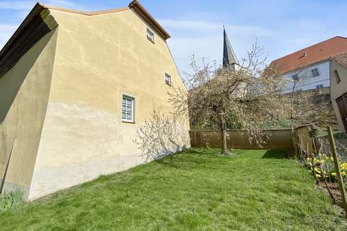 Ansicht vom Garten - Einfamilienhaus in 97447 Frankenwinheim mit 230m² kaufen