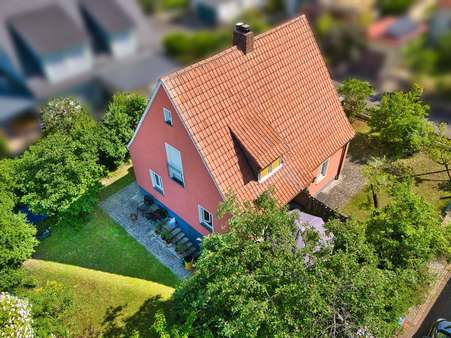 Rückansicht mit Garten Rückansicht mit Garten - Einfamilienhaus in 97753 Karlstadt mit 98m² kaufen