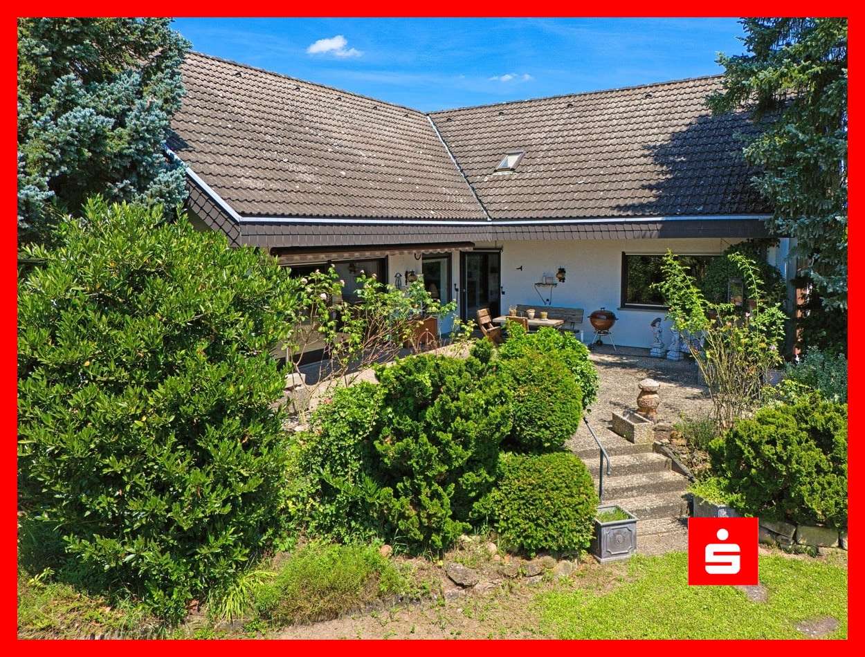 Gartenansicht mit Terrasse - Einfamilienhaus in 97753 Karlstadt mit 270m² kaufen