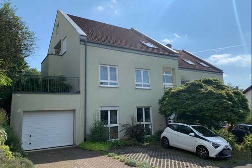 Ansicht Nord-Ost - Dachgeschosswohnung in 97453 Schonungen mit 157m² kaufen