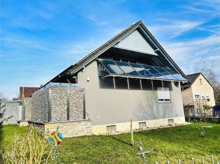 Gartenansicht mit Loggia und vorinstallierter Solaranlage - Einfamilienhaus in 97437 Haßfurt mit 175m² kaufen