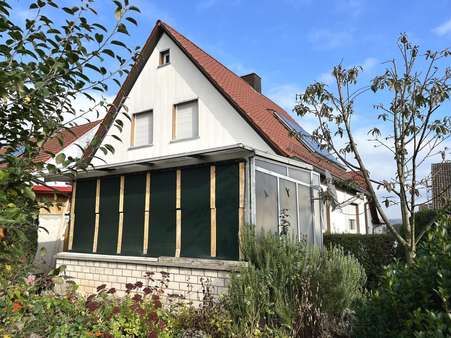 Gartenansicht mit Pergola Gartenansicht mit Pergola - Einfamilienhaus in 97437 Haßfurt mit 100m² kaufen