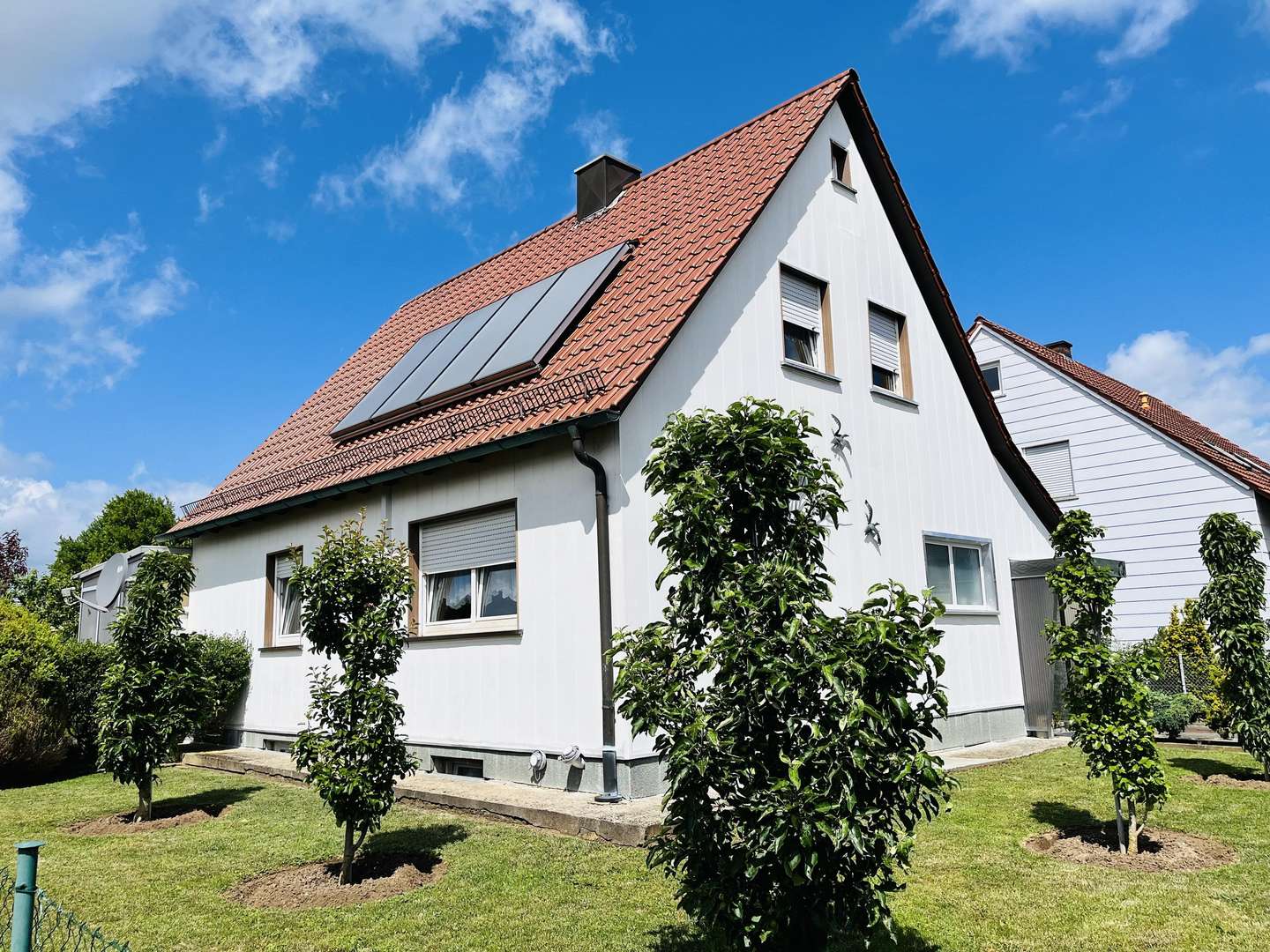 Sonnenverwöhnte, ruhige Lage... die Südostansicht des Hauses Sonnenverwöhnte, ruhige Lage... die Südostansicht des Hauses - Einfamilienhaus in 97437 Haßfurt mit 100m² kaufen