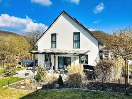 die Gartenansicht des Hauses - Einfamilienhaus in 97475 Zeil mit 135m² kaufen