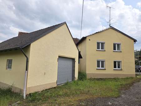 Nord-West Ansicht - Einfamilienhaus in 96126 Maroldsweisach mit 110m² kaufen