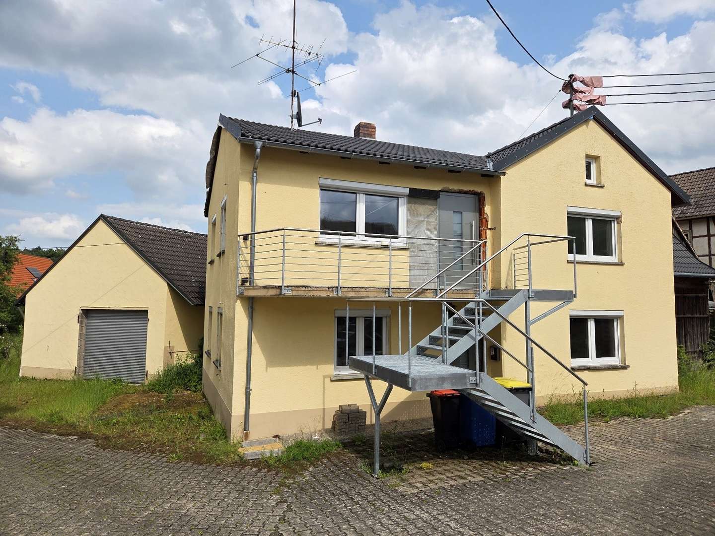 West Ansicht - Einfamilienhaus in 96126 Maroldsweisach mit 110m² kaufen