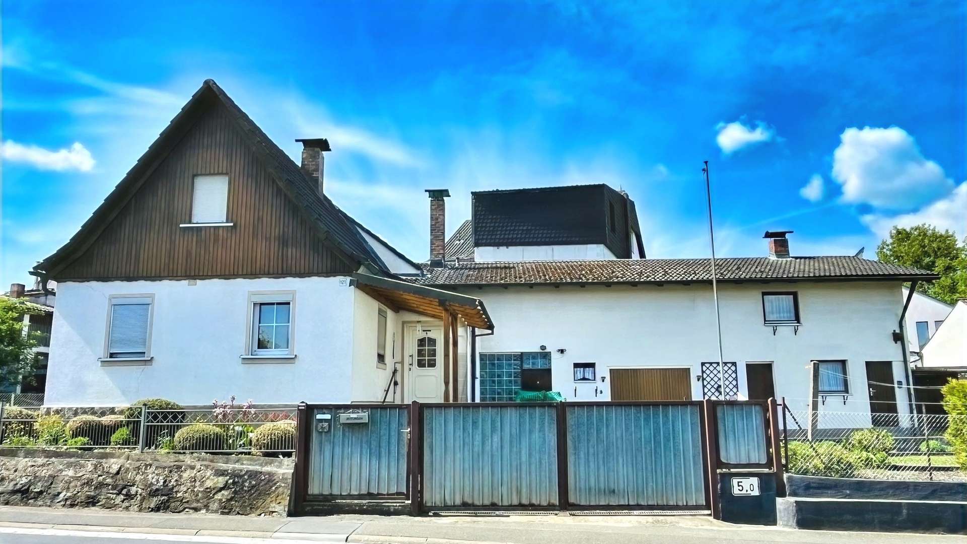 Nordostansicht des Hauses - Einfamilienhaus in 97478 Knetzgau mit 110m² kaufen