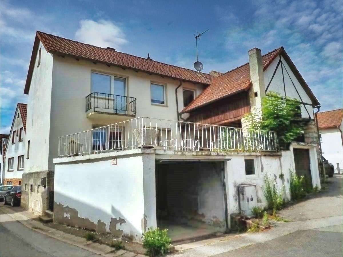 Südansicht des Hauses Südansicht des Hauses - Einfamilienhaus in 97514 Oberaurach mit 140m² kaufen