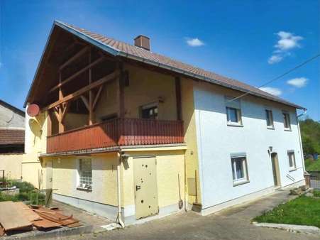 Südansicht mit überdachter Terrasse - Einfamilienhaus in 97486 Königsberg mit 190m² kaufen