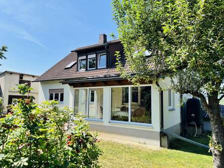 Gartenansicht mit Wintergarten Gartenansicht mit Wintergarten - Einfamilienhaus in 97491 Aidhausen mit 180m² kaufen