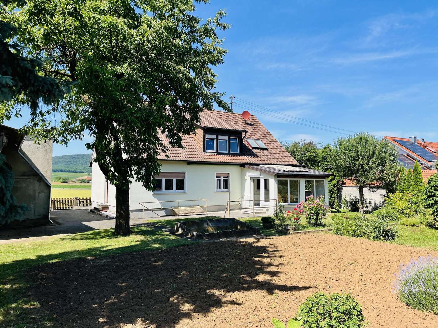 Wohnen im sonnigen Grün… die Gartenansicht Wohnen im sonnigen Grün… die Gartenansicht - Einfamilienhaus in 97491 Aidhausen mit 180m² kaufen