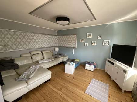 Wohnzimmer - Einfamilienhaus in 97723 Oberthulba mit 114m² kaufen