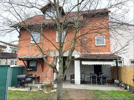 Gartenansicht - Zweifamilienhaus in 63811 Stockstadt mit 248m² kaufen