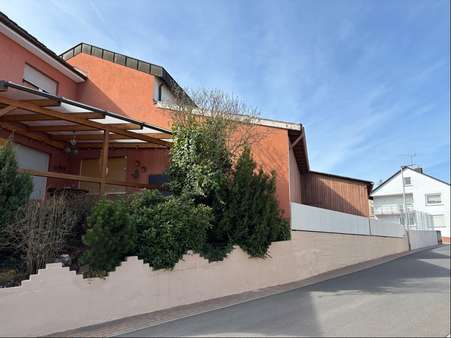 Seitenansicht - Zweifamilienhaus in 63829 Krombach mit 237m² kaufen