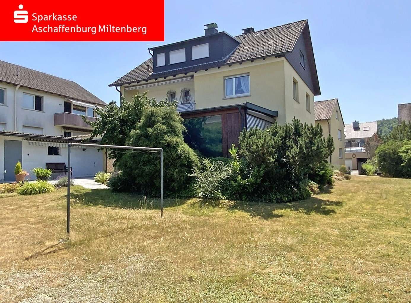 Gartenansicht - Zweifamilienhaus in 63906 Erlenbach mit 152m² kaufen