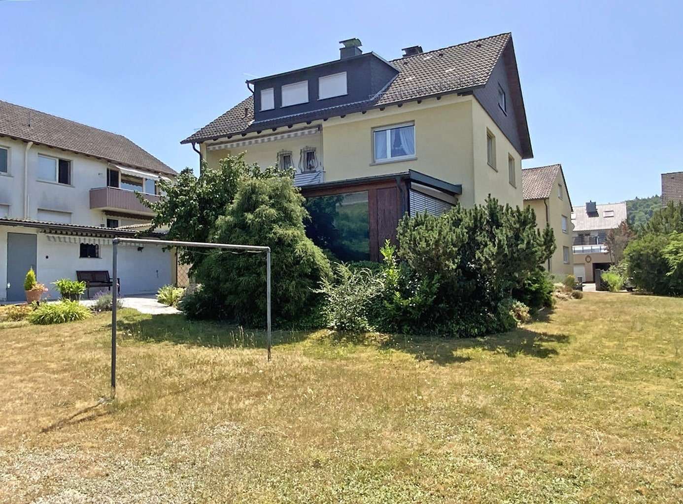 Gartenansicht - Zweifamilienhaus in 63906 Erlenbach mit 152m² kaufen