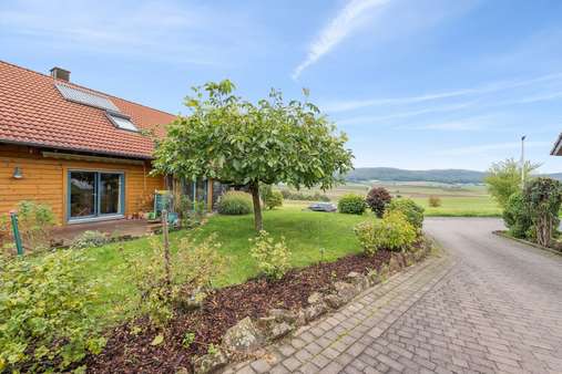 Seitenansicht Seitenansicht - Einfamilienhaus in 63933 Mönchberg, Schmachtenberg mit 180m² kaufen