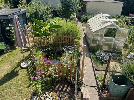 Blick in den sonnigen Garten - Zweifamilienhaus in 63768 Hösbach mit 168m² kaufen