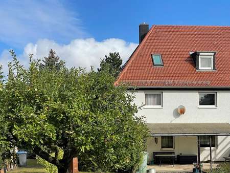 Blick vom Garten - Doppelhaushälfte in 06729 Elsteraue mit 140m² kaufen