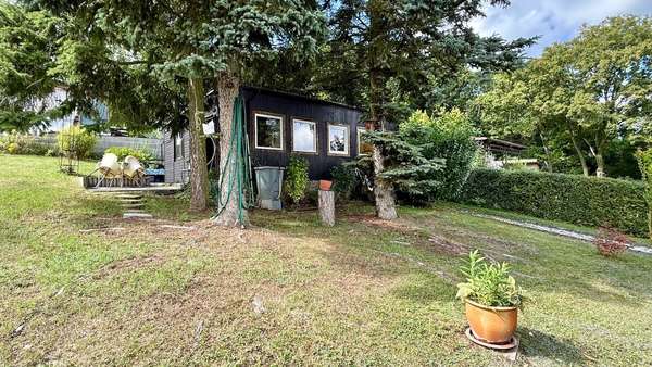 Blick zum Bungalow Blick zum Bungalow - Haus in 06632 Freyburg mit 39m² kaufen