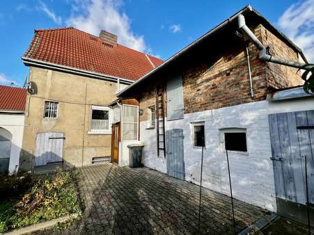 Rückansicht mit Anbau - Einfamilienhaus in 06862 Dessau-Roßlau mit 95m² kaufen