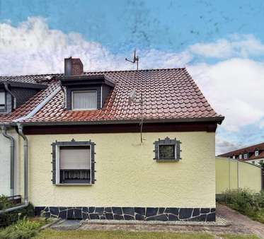 Seitenansicht Seitenansicht - Reihenendhaus in 06862 Dessau-Roßlau mit 76m² kaufen