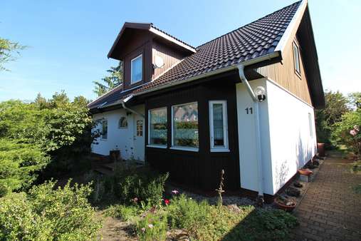 Vorderseite - Einfamilienhaus in 06779 Raguhn-Jeßnitz mit 132m² kaufen