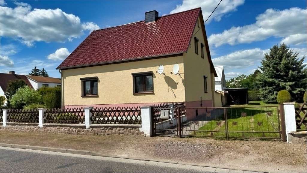 Foto-Vorderansicht - Einfamilienhaus in 06369 Großbadegast mit 110m² kaufen