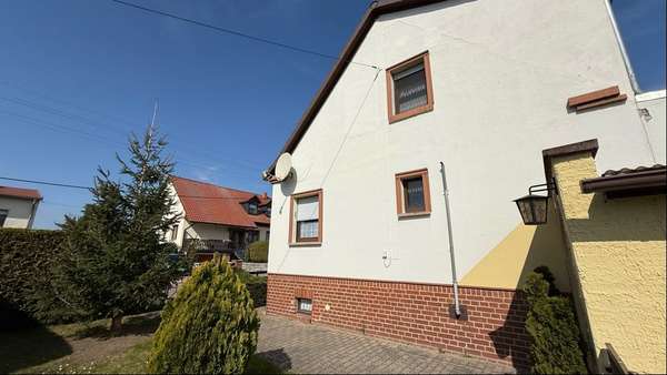 Foto-Seitenansicht - Doppelhaushälfte in 06369 Glauzig mit 80m² kaufen