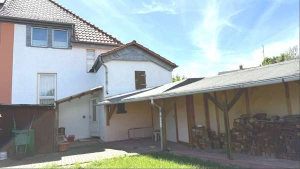Foto-Rückansicht Foto-Rückansicht - Doppelhaushälfte in 06386 Osternienburger Land mit 84m² kaufen
