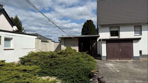 Foto-Hofansicht - Einfamilienhaus in 06369 Görzig mit 130m² kaufen