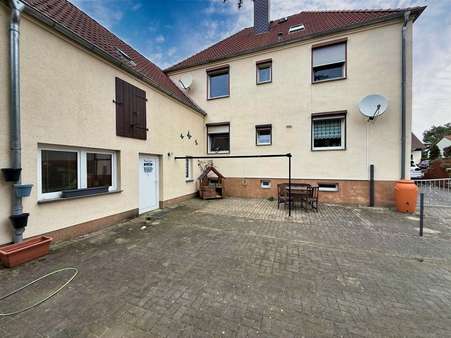 Hinteransicht - Zweifamilienhaus in 06779 Raguhn-Jeßnitz, Raguhn mit 120m² kaufen