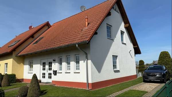 Foto-Seitenansicht - Zweifamilienhaus in 39261 Zerbst mit 135m² kaufen
