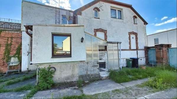 Foto-Seitenansicht Foto-Seitenansicht - Doppelhaushälfte in 06385 Aken mit 120m² kaufen