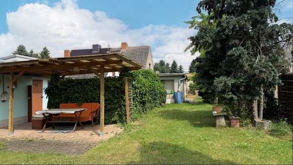 Foto-Gartenansicht Foto-Gartenansicht - Zweifamilienhaus in 06385 Aken mit 75m² kaufen