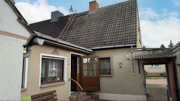Foto-Rückansicht Foto-Rückansicht - Zweifamilienhaus in 06385 Aken mit 75m² kaufen