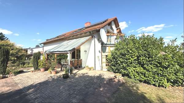 Foto-Rückansicht Foto-Rückansicht - Einfamilienhaus in 06386 Osternienburger Land mit 220m² kaufen