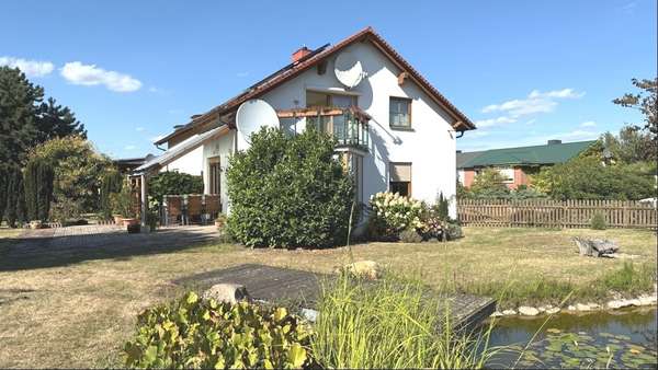 Foto-Seitenansicht Foto-Seitenansicht - Einfamilienhaus in 06386 Osternienburger Land mit 220m² kaufen