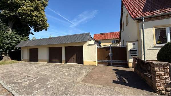 Foto-Außenansicht Garagen Foto-Außenansicht Garagen - Doppelhaushälfte in 06388 Edderitz mit 95m² kaufen