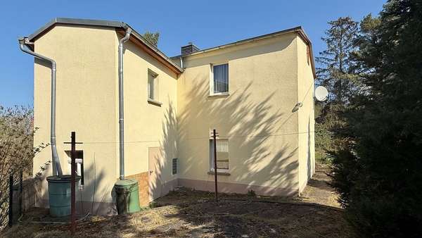 Rückansicht vom Grundstück - Einfamilienhaus in 06193 Wettin-Löbejün mit 108m² kaufen