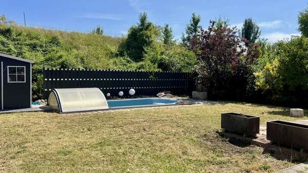 Garten mit Pool Garten mit Pool - Einfamilienhaus in 06317 Seegebiet Mansfelder Land mit 102m² kaufen