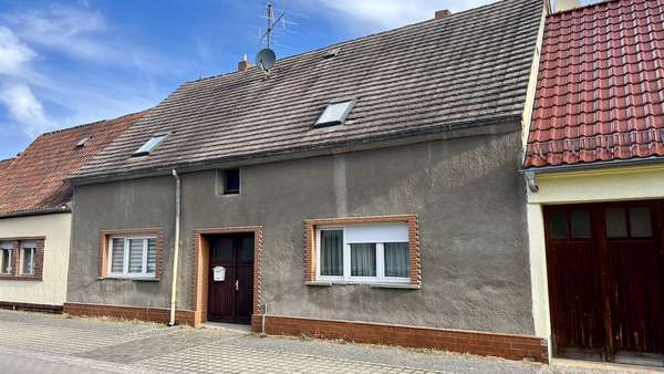 Front Front - Reihenmittelhaus in 06785 Oranienbaum-Wörlitz mit 120m² kaufen