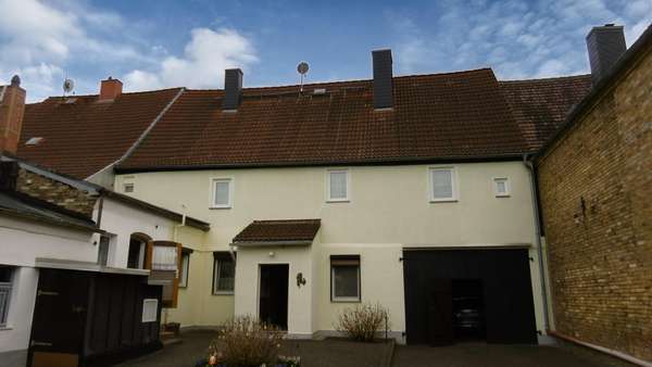 Hinteransicht Hinteransicht - Reihenmittelhaus in 06895 Zahna-Elster mit 150m² kaufen