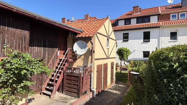 Rückansicht mit Stall - Reihenmittelhaus in 06485 Quedlinburg mit 135m² kaufen